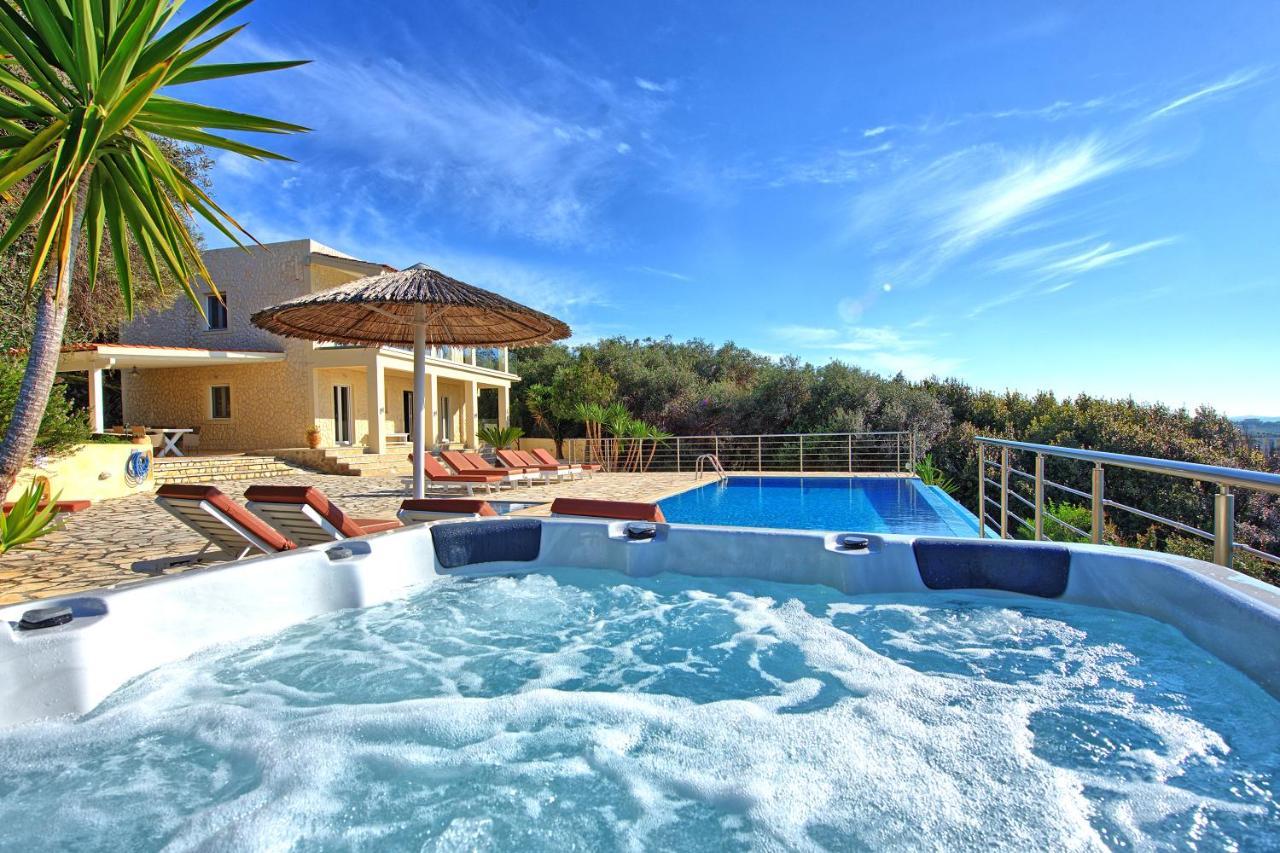 Agios Spyridon  Beachfront Villa Seasun By Posarellivillas מראה חיצוני תמונה