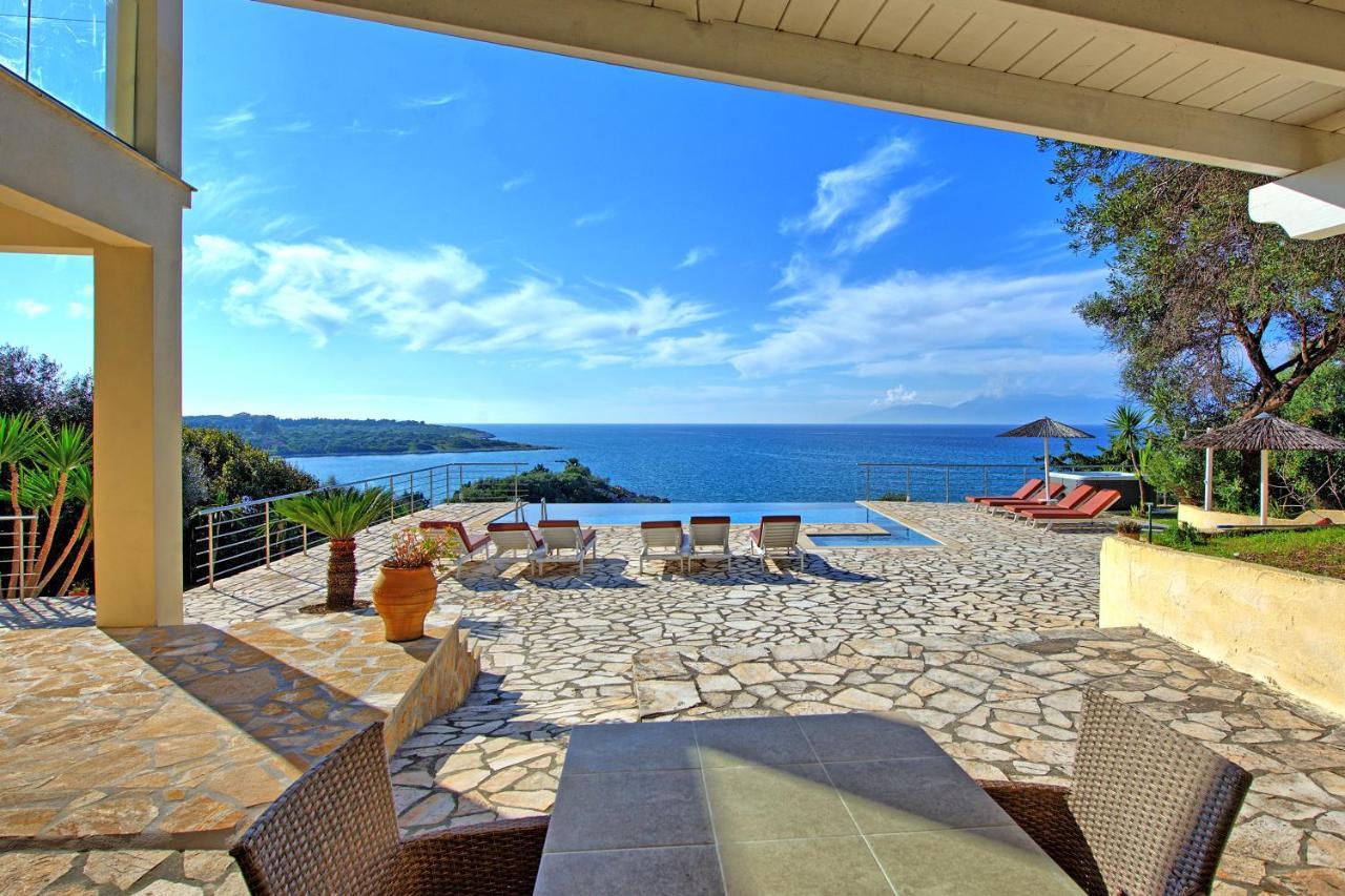 Agios Spyridon  Beachfront Villa Seasun By Posarellivillas מראה חיצוני תמונה